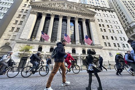Stock market today: Wall Street wobbles as the Fed is still uncertain about more hikes to rates